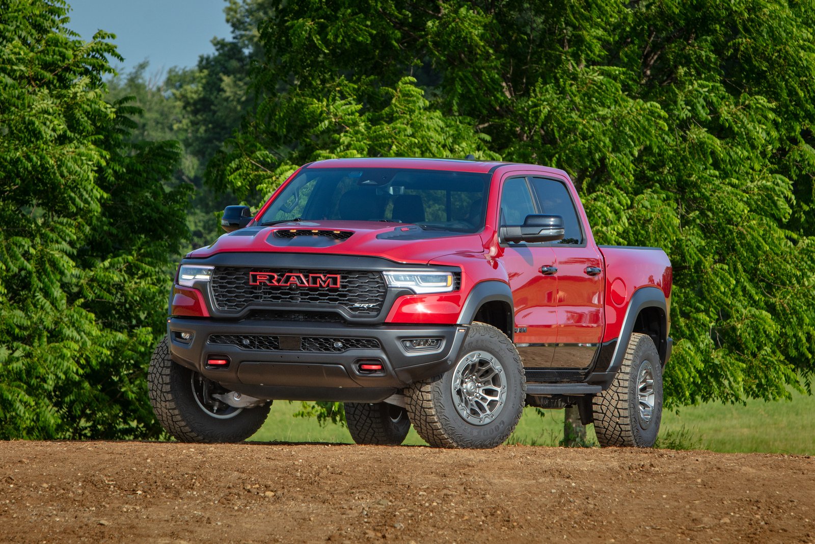 Red 2027 Ram 1500 SRT TRX pickup in front three-quarter view