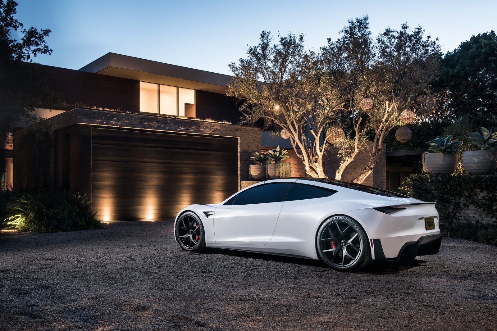 White 2017 Tesla Roadster prototype, rear three-quarter view at dusk