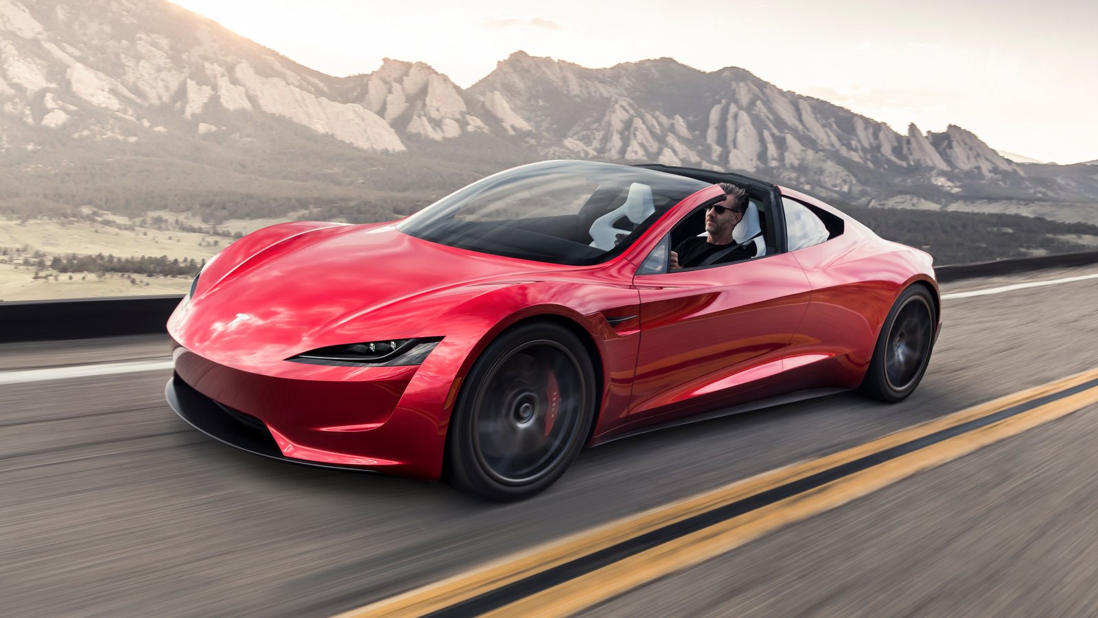 2017 Tesla Roadster prototype driving with the roof panel removed