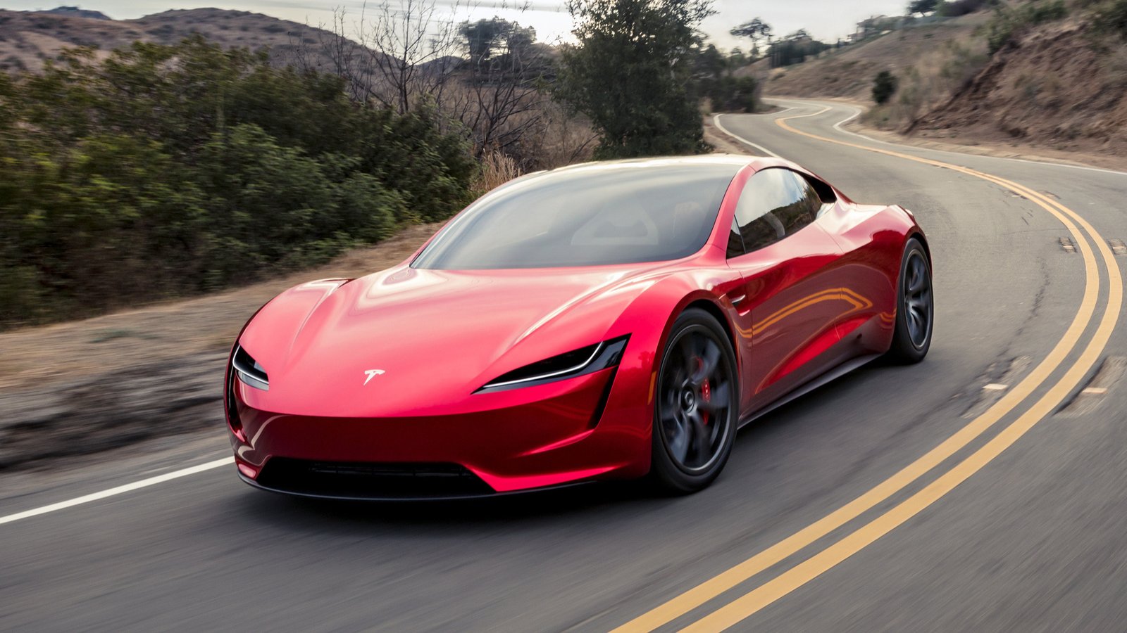 2017 Tesla Roadster prototype cornering on a two-lane canyon road