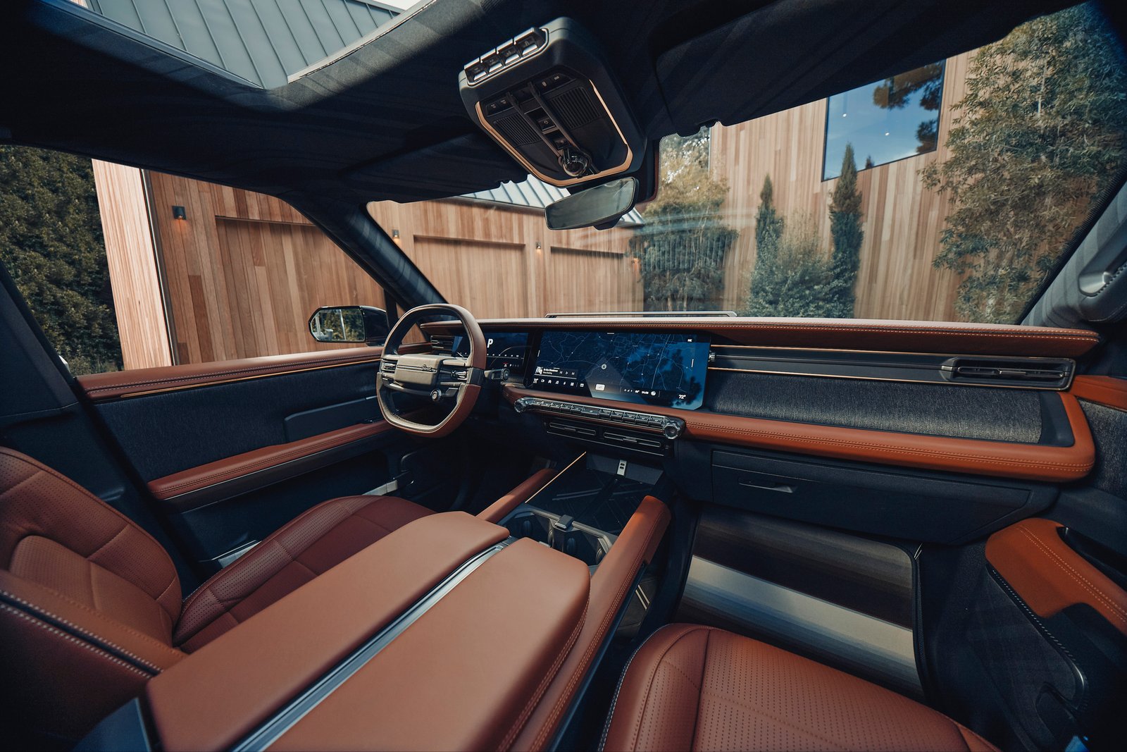 Trail-ready Traveler concept interior with Brick Red leather and denim fabric