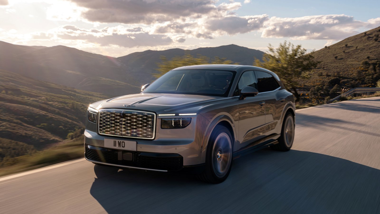 Silver Bentley Torcal driving on a mountain road