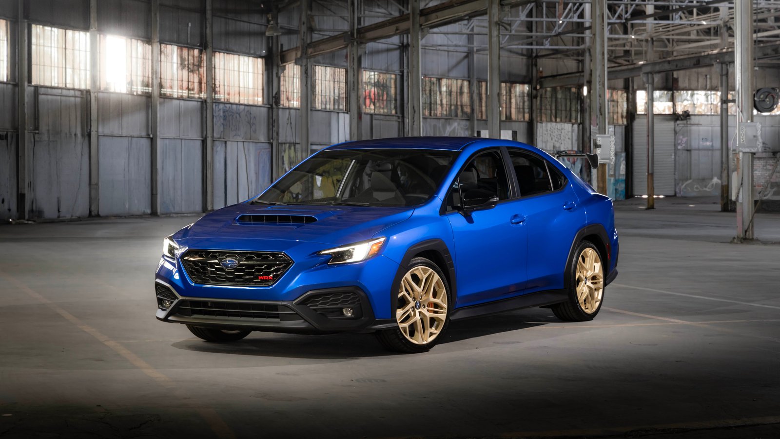 Subaru WRX GD25 in World Rally Blue with gold wheels