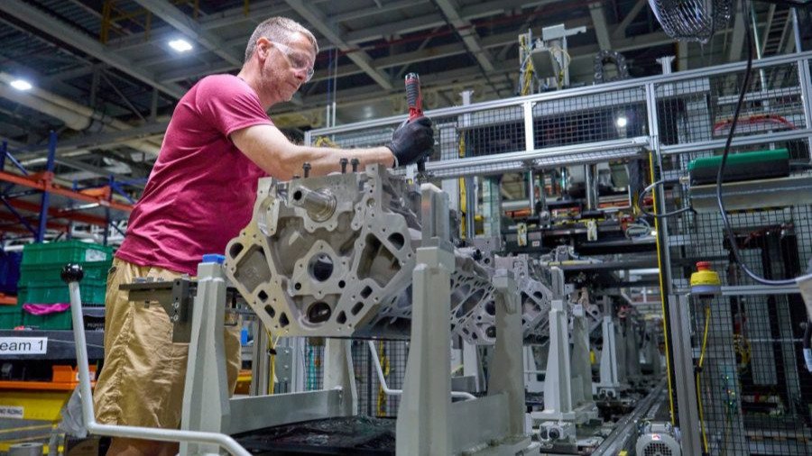 Worker assembling a sixth-generation Small Block V8 at GM Flint Engine Operations