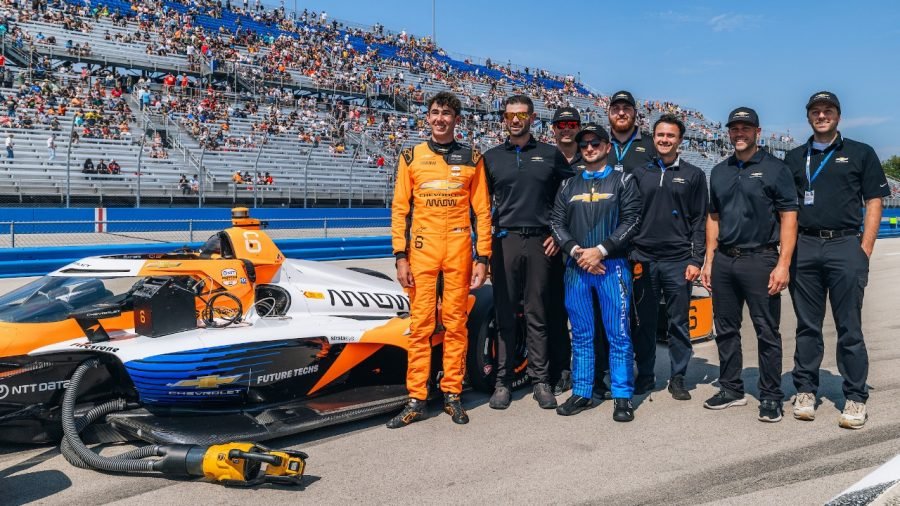 Nolan Siegel and Chevrolet crew posing with No. 6 at Milwaukee