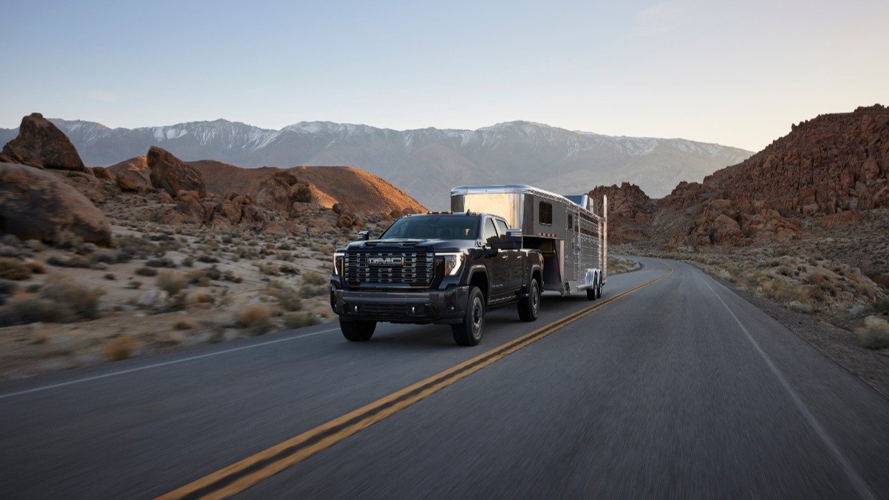 2027 GMC Sierra HD Denali Ultimate towing a trailer