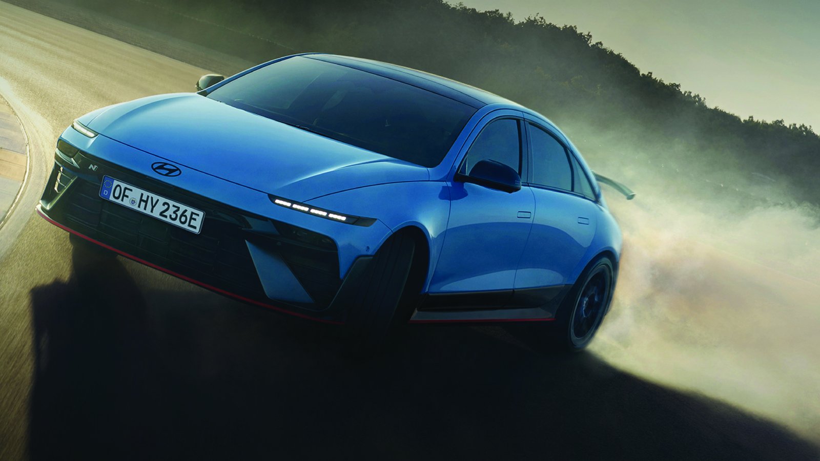 Blue Hyundai Ioniq 6 N drifting on a racetrack
