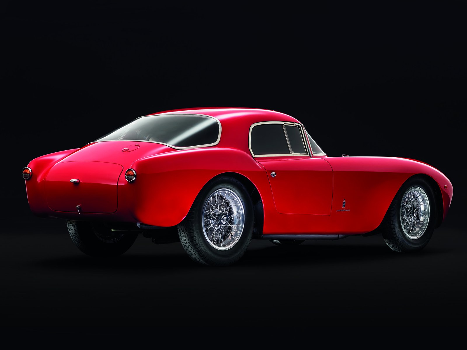 Rear three-quarter view of the red Maserati A6GCS berlinetta by Pininfarina