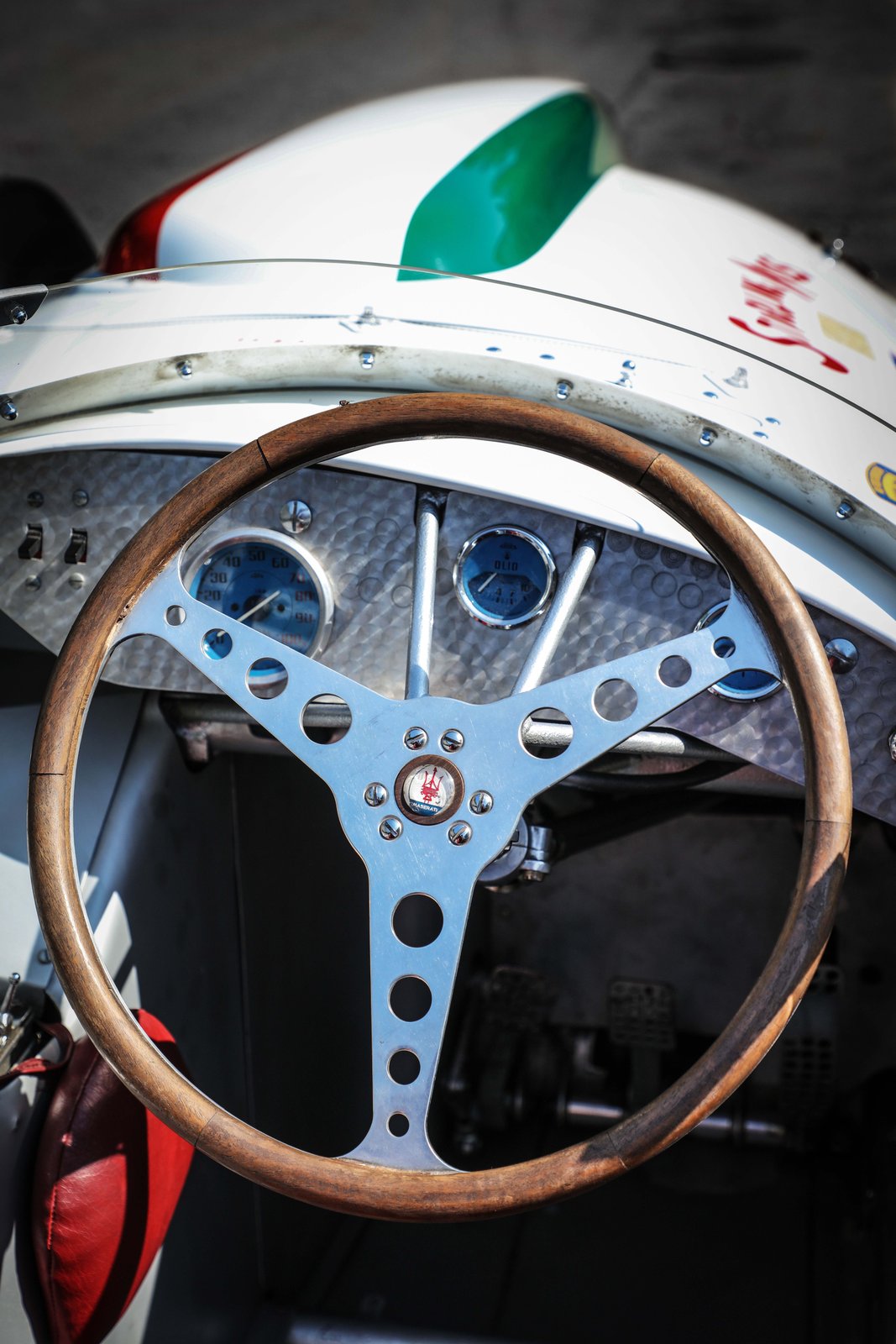Wood-rimmed steering wheel and gauges in the Maserati Eldorado cockpit