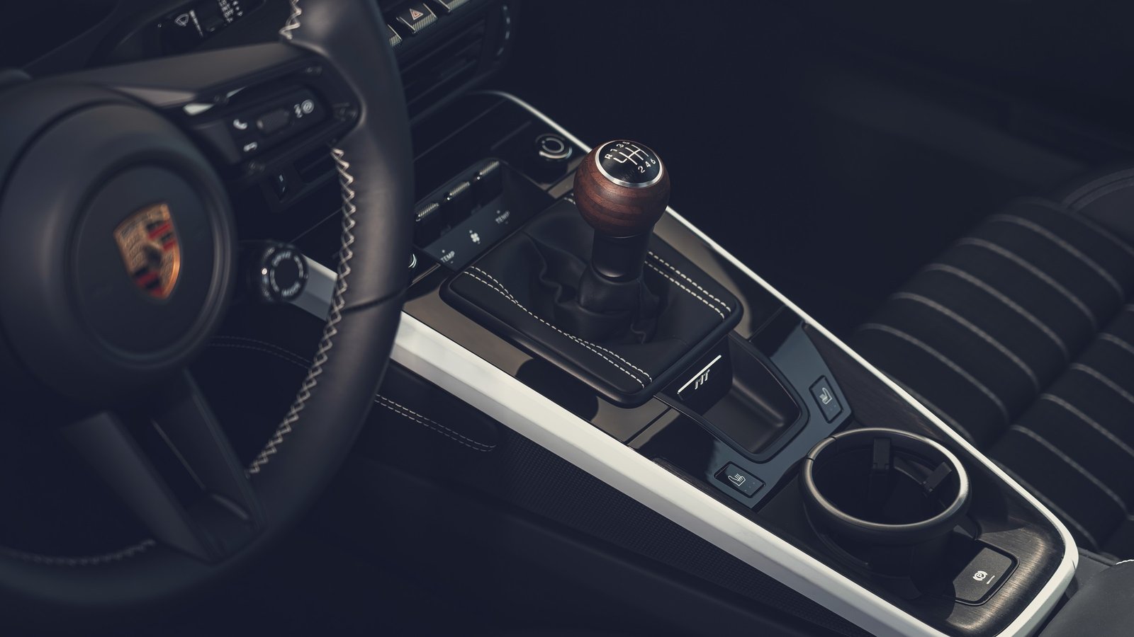 Six-speed manual shifter with wooden knob in the 2027 Porsche 911 Carrera S
