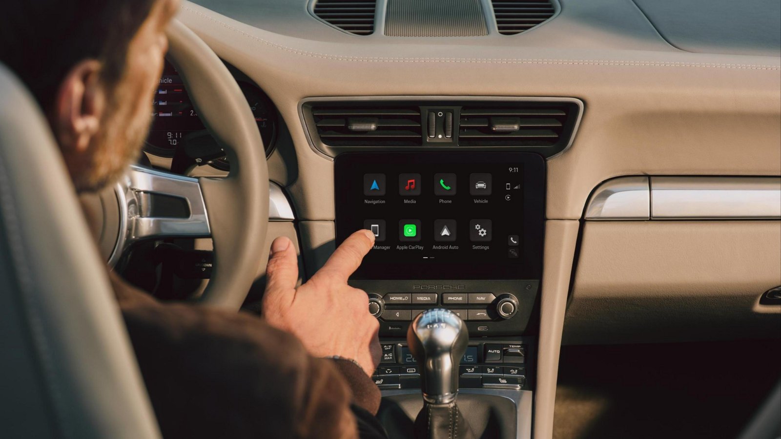 PCCM Plus home screen with CarPlay and Android Auto tiles in a Porsche 911 (991)