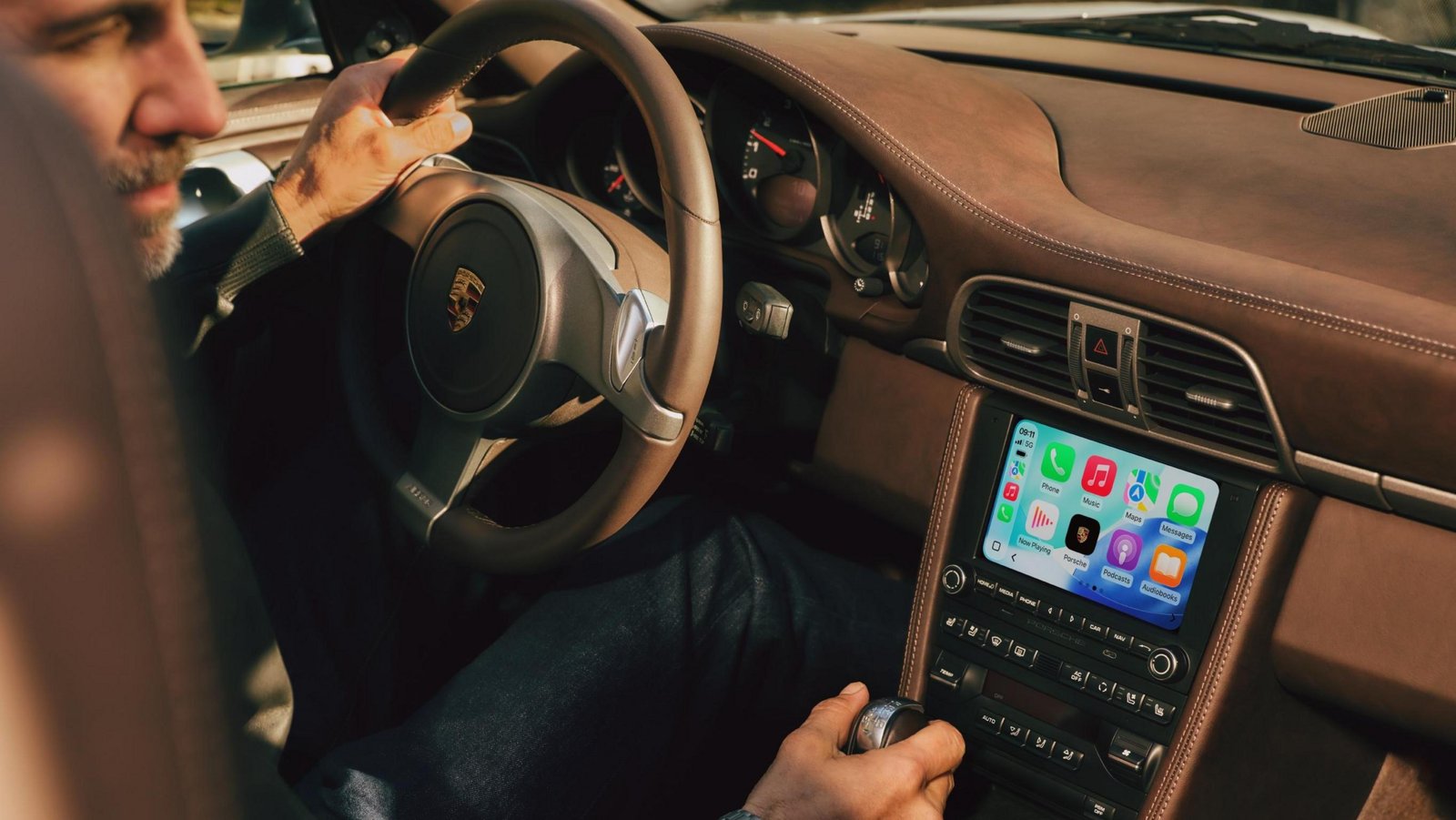 Apple CarPlay running on PCCM Plus in a Porsche 911 (997) interior