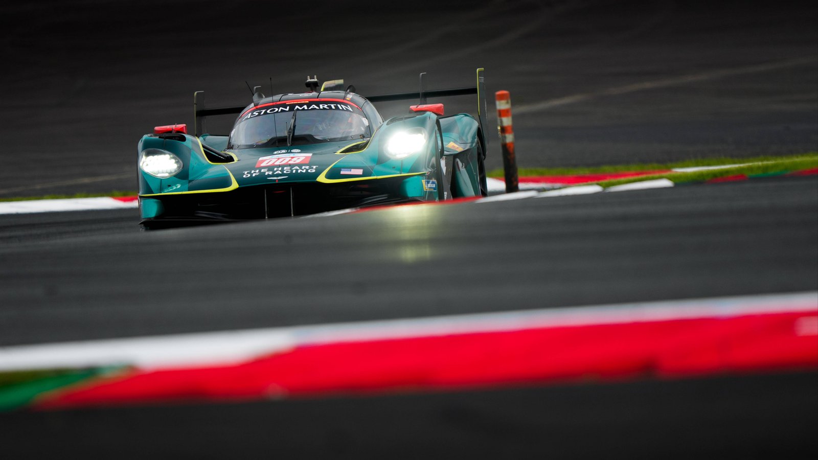 The #009 Aston Martin Valkyrie of Riberas and Sørensen on the curbs at Fuji
