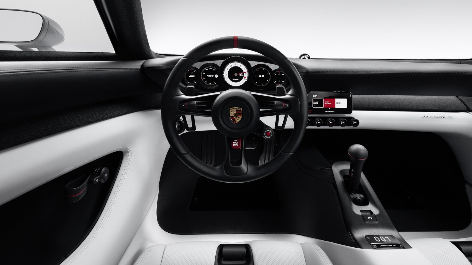 Porsche Mission S concept dashboard with five round gauges and phone holder