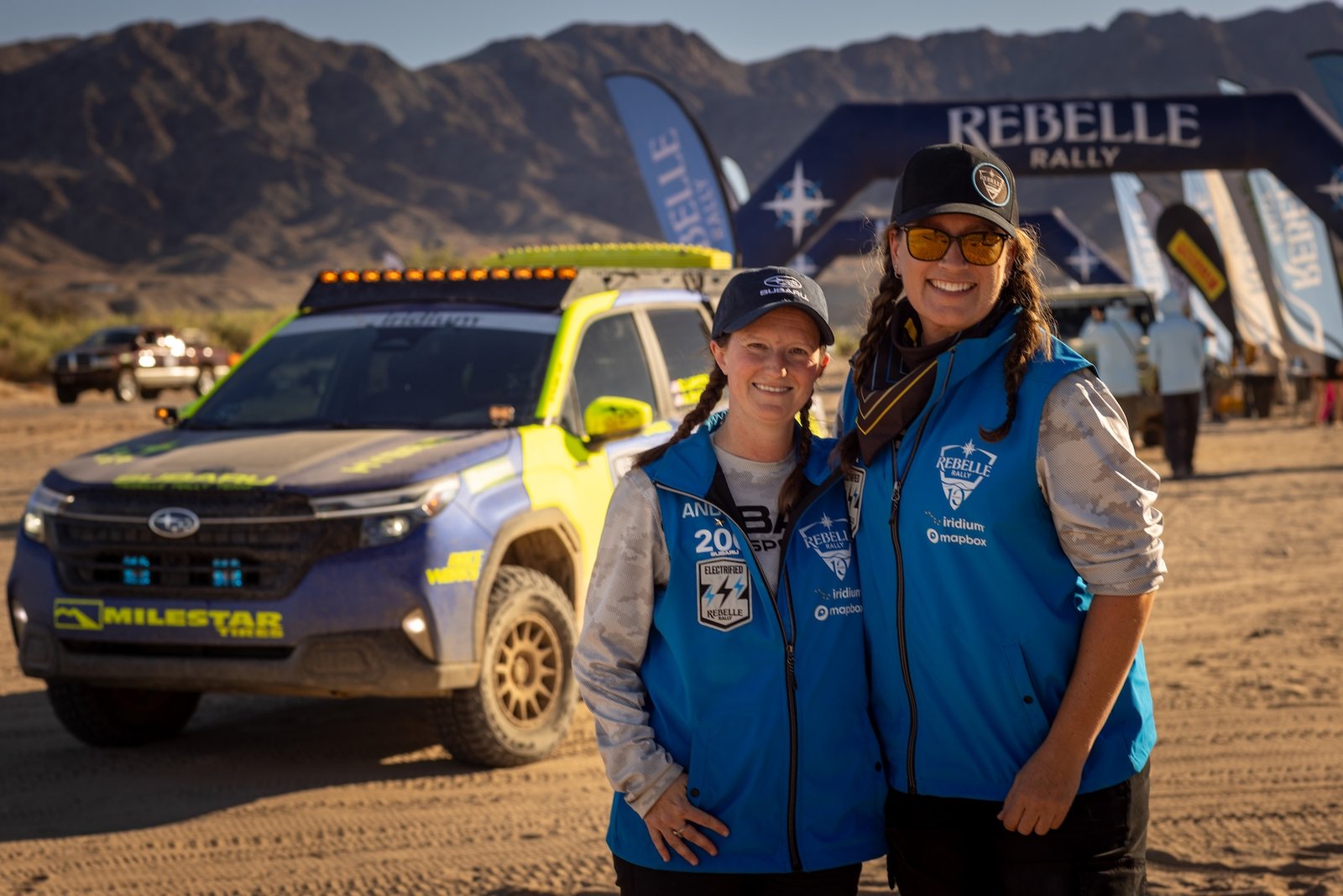 Rebelle Rally champions Carey Lando and Andrea Shaffer standing beside their Forester