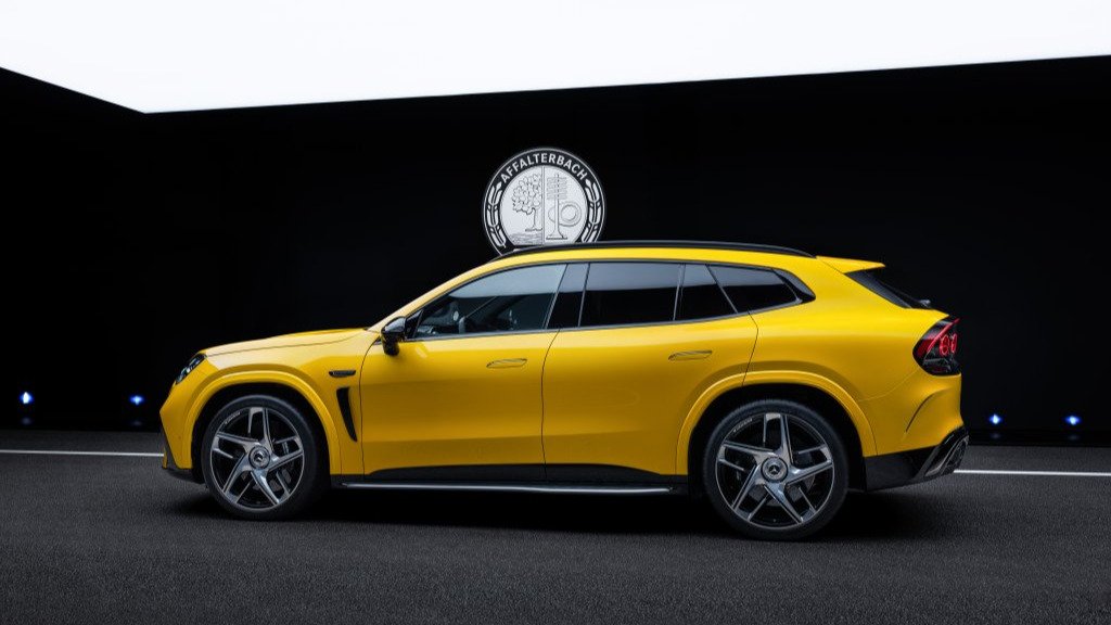 Yellow Mercedes-AMG GT SUV side profile in a studio
