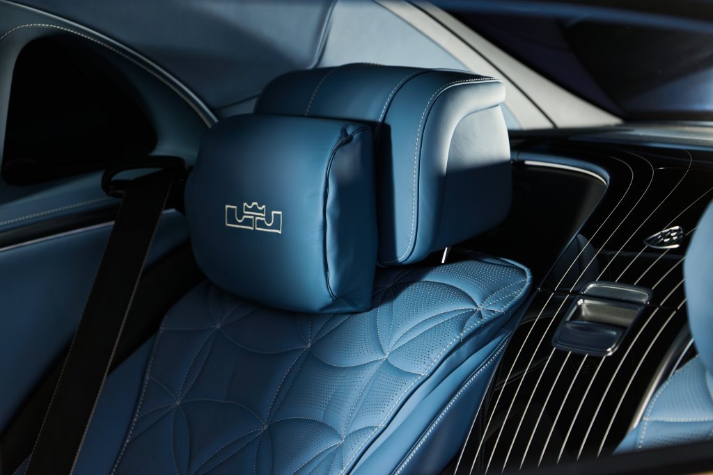 Embroidered LeBron James crown logo on a blue Nappa Maybach headrest