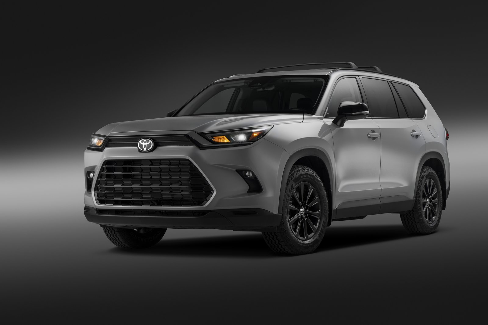 2027 Toyota Grand Highlander Hybrid Woodland Edition with all-terrain tires