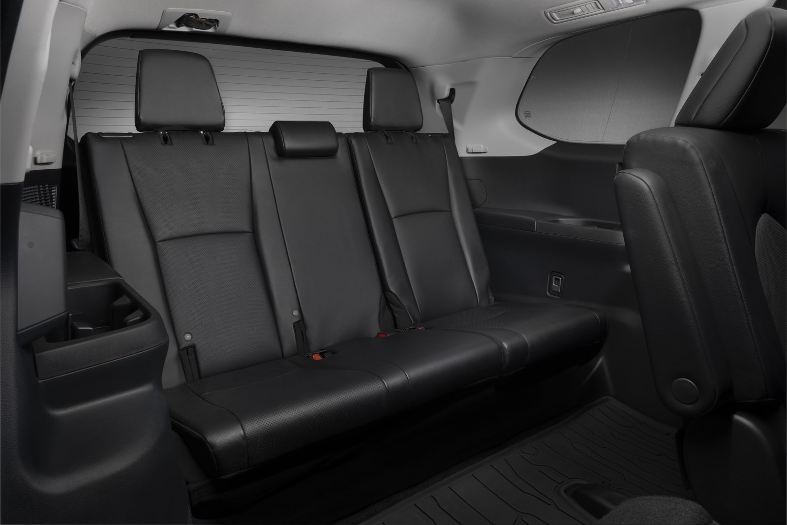 Black leather third-row bench in the Grand Highlander Woodland