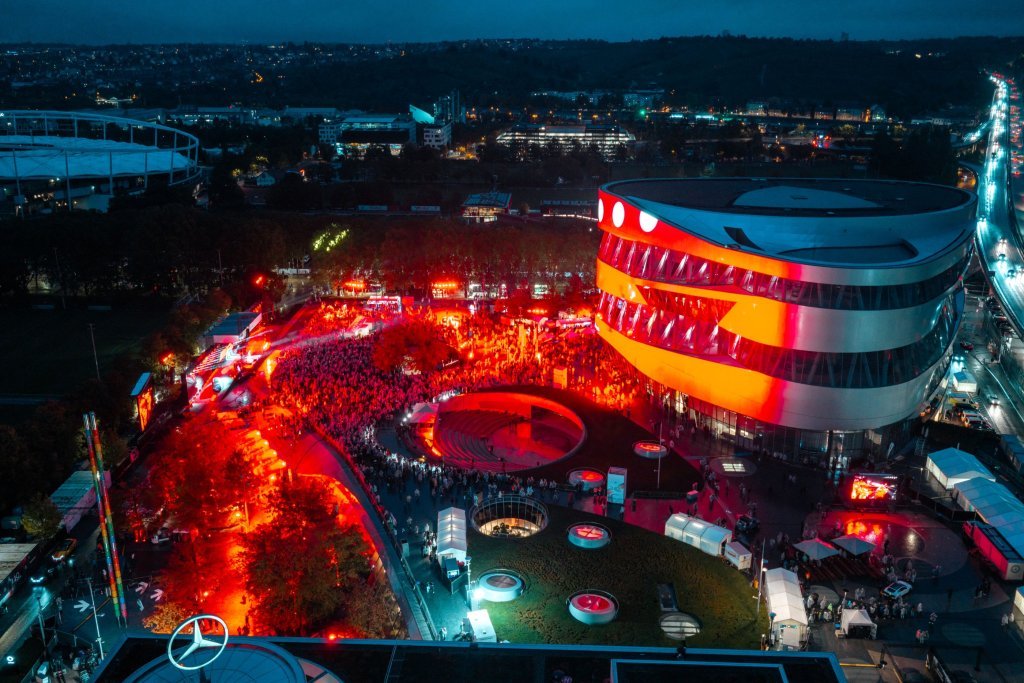 Aerial night view of The 140 Festival at the Mercedes-Benz Museum, Stuttgart