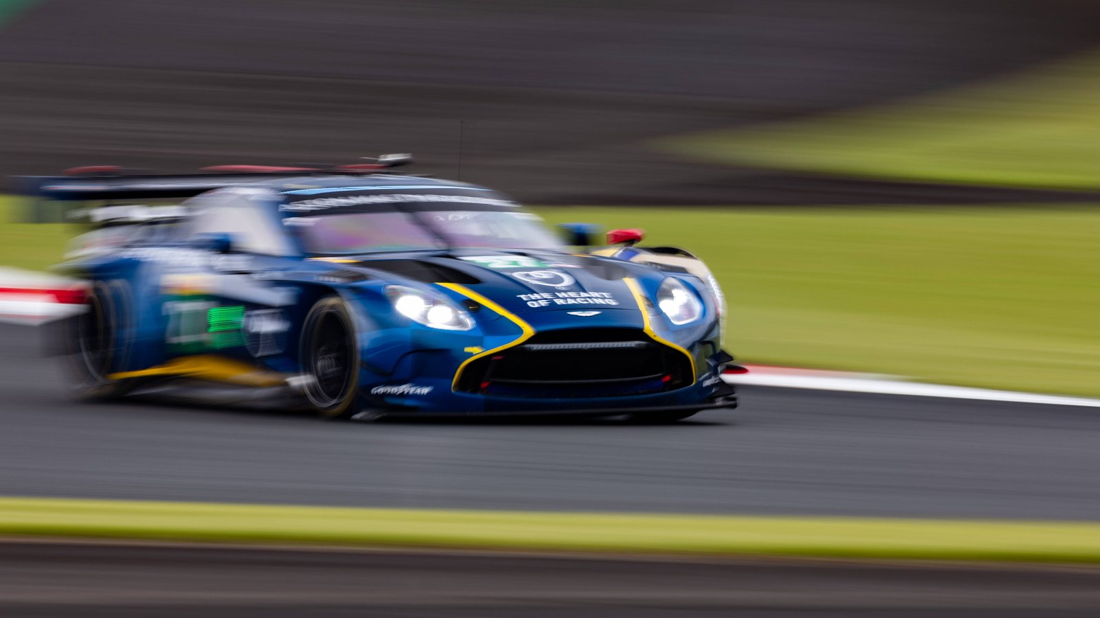 The #27 Heart of Racing Aston Martin Vantage LMGT3 at speed at Fuji