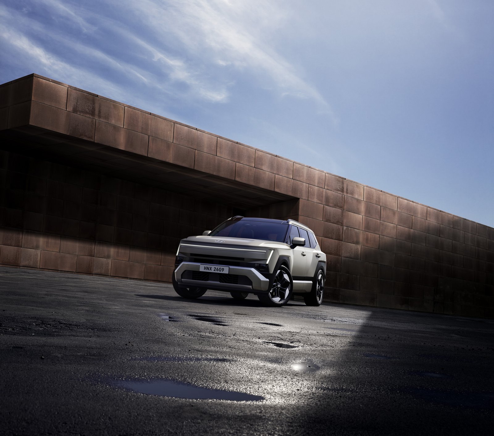 2027 Hyundai Tucson front three-quarter view with full-width light bar