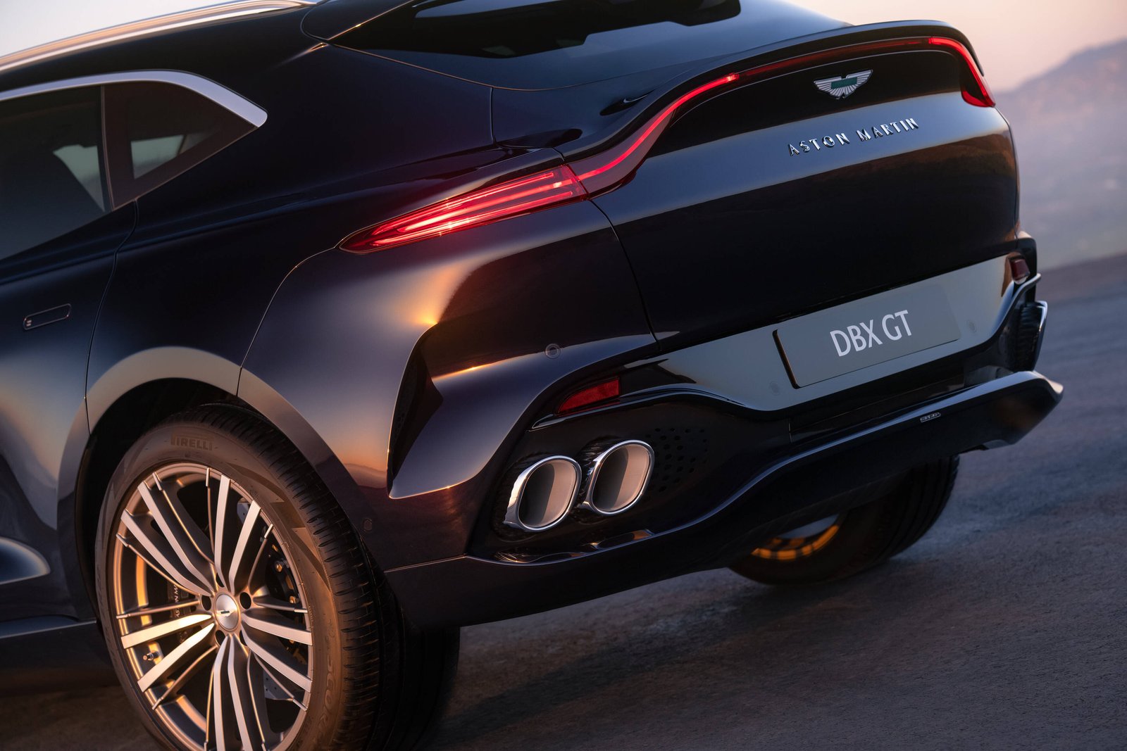 Aston Martin DBX GT rear quarter with side-by-side quad exhaust tips