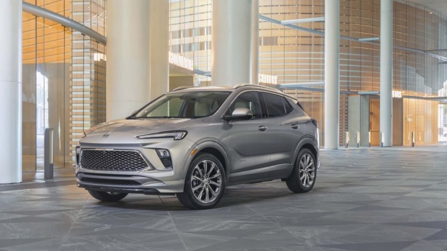 Silver Buick Encore GX subcompact crossover parked in a building lobby