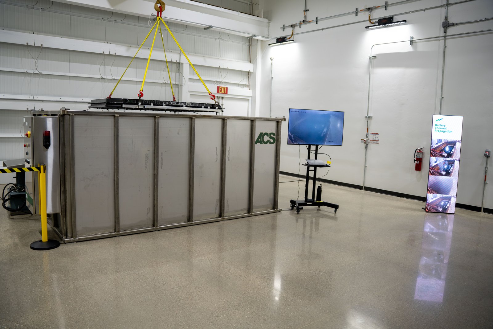 Enclosed battery test bunker with overhead lifting rig at Toyota's battery center