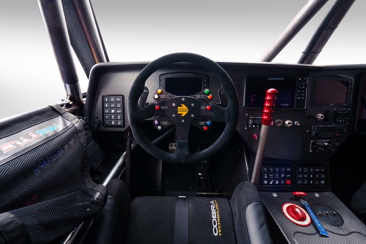 Cockpit of the Passport Baja Spec. The steering wheel and dashboard, front view.