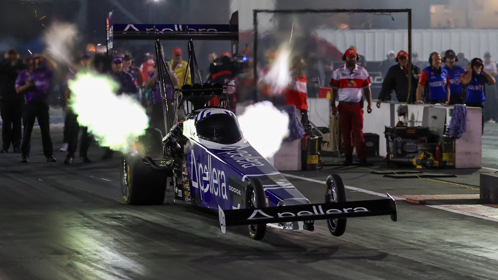 Leah Pruett's Dodge Top Fuel dragster launching at World Wide Technology Raceway