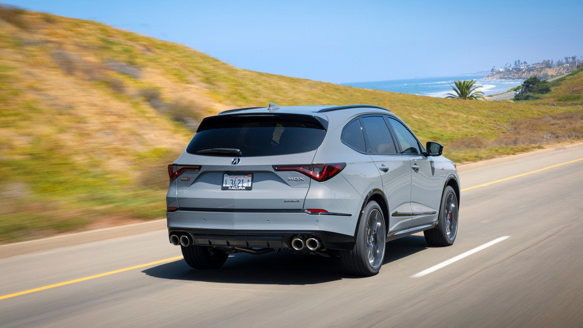 2026 Acura MDX Type S rear view driving on a coastal road