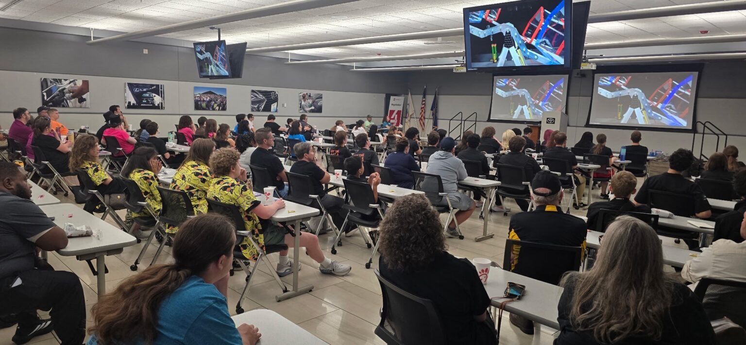 Students and mentors watch the CANOPY game reveal at Toyota Kentucky