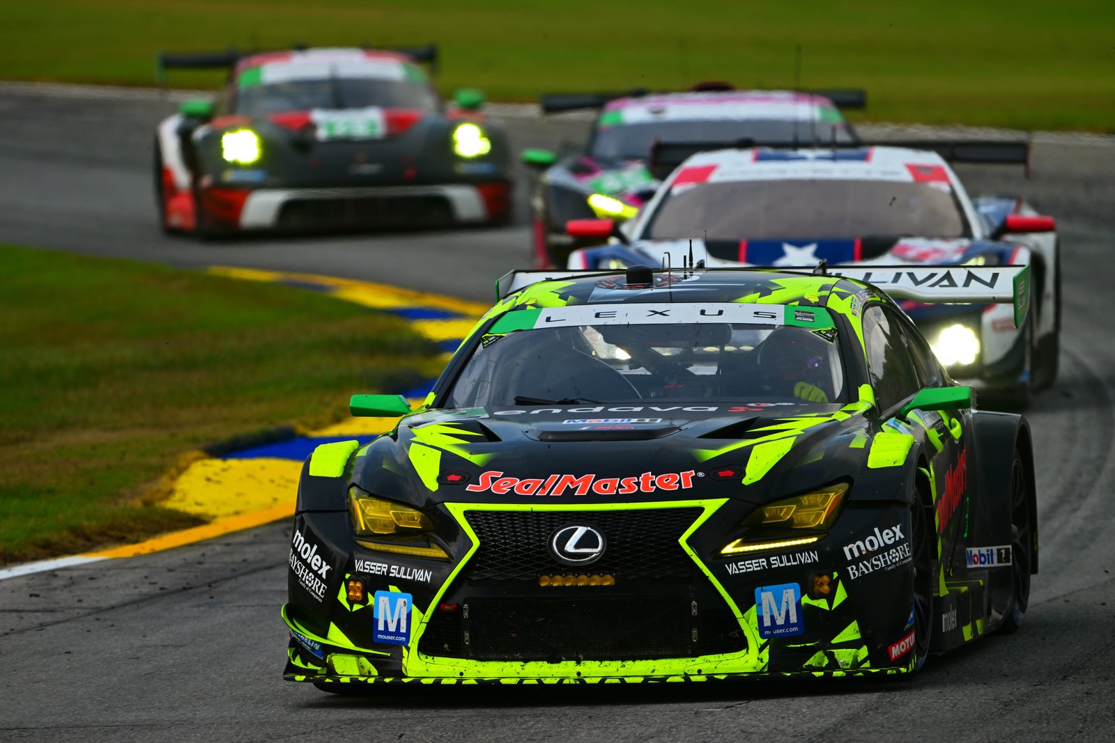 Vasser Sullivan Lexus RC F GT3 leading Corvette and Porsche GT3 cars