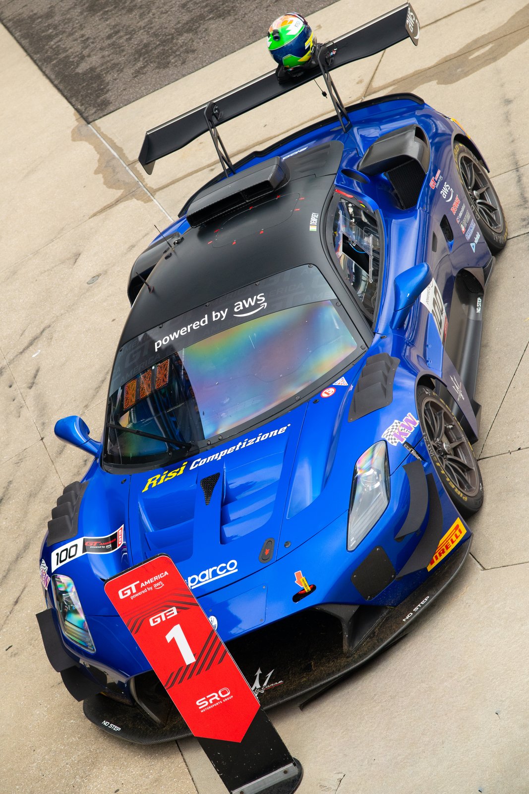 Overhead view of the Maserati GT2 with a first-place board after the race