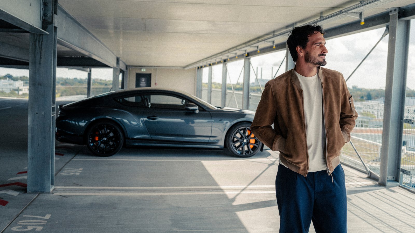Former Germany defender Mats Hummels standing in a parking garage