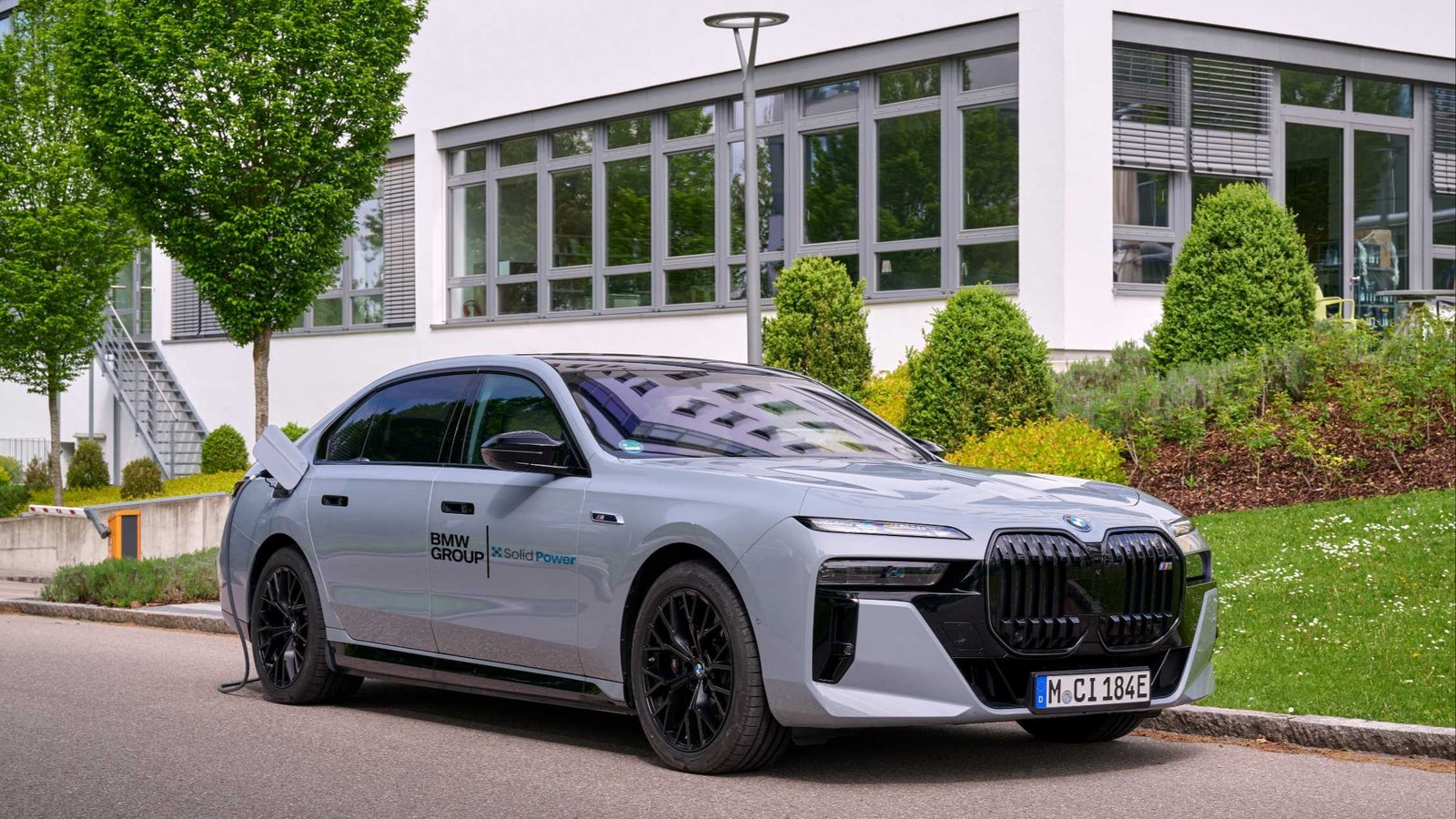 BMW i7 test car with Solid Power battery cells plugged in to charge