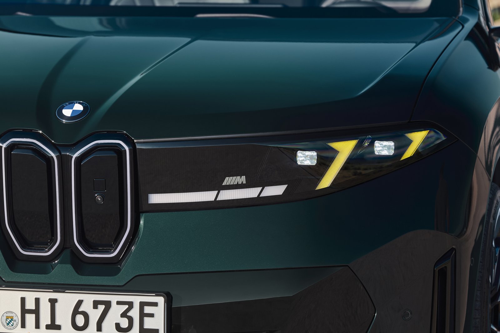 Close-up of the BMW iX3 M60 xDrive headlight with M Yellow Lights