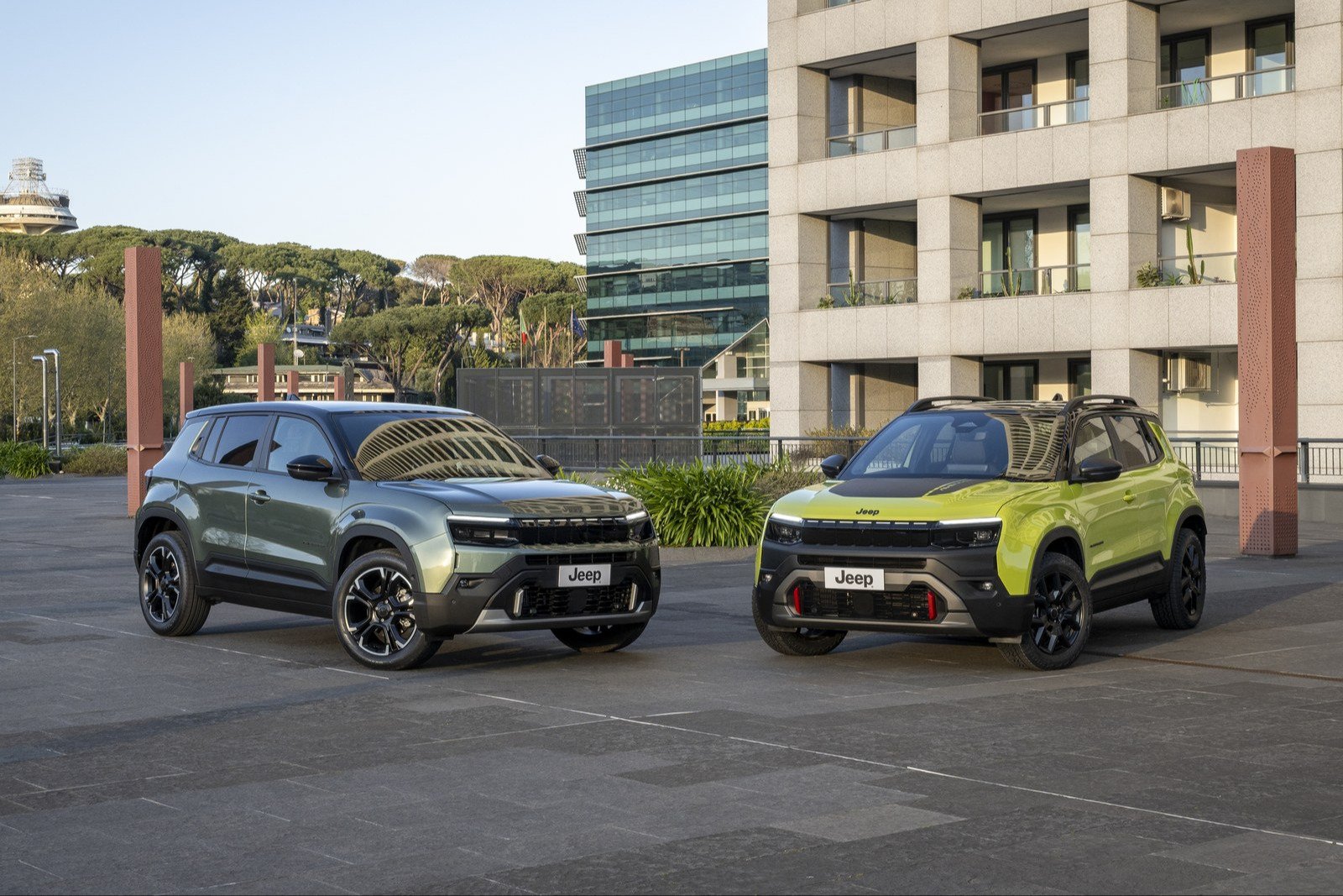Jeep Avenger in Bamboo and Avenger 4xe on a city plaza