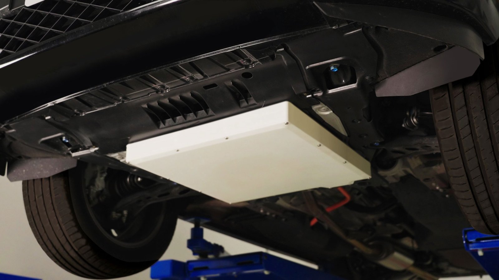 Honda prototype wireless charging receiver mounted under a test vehicle