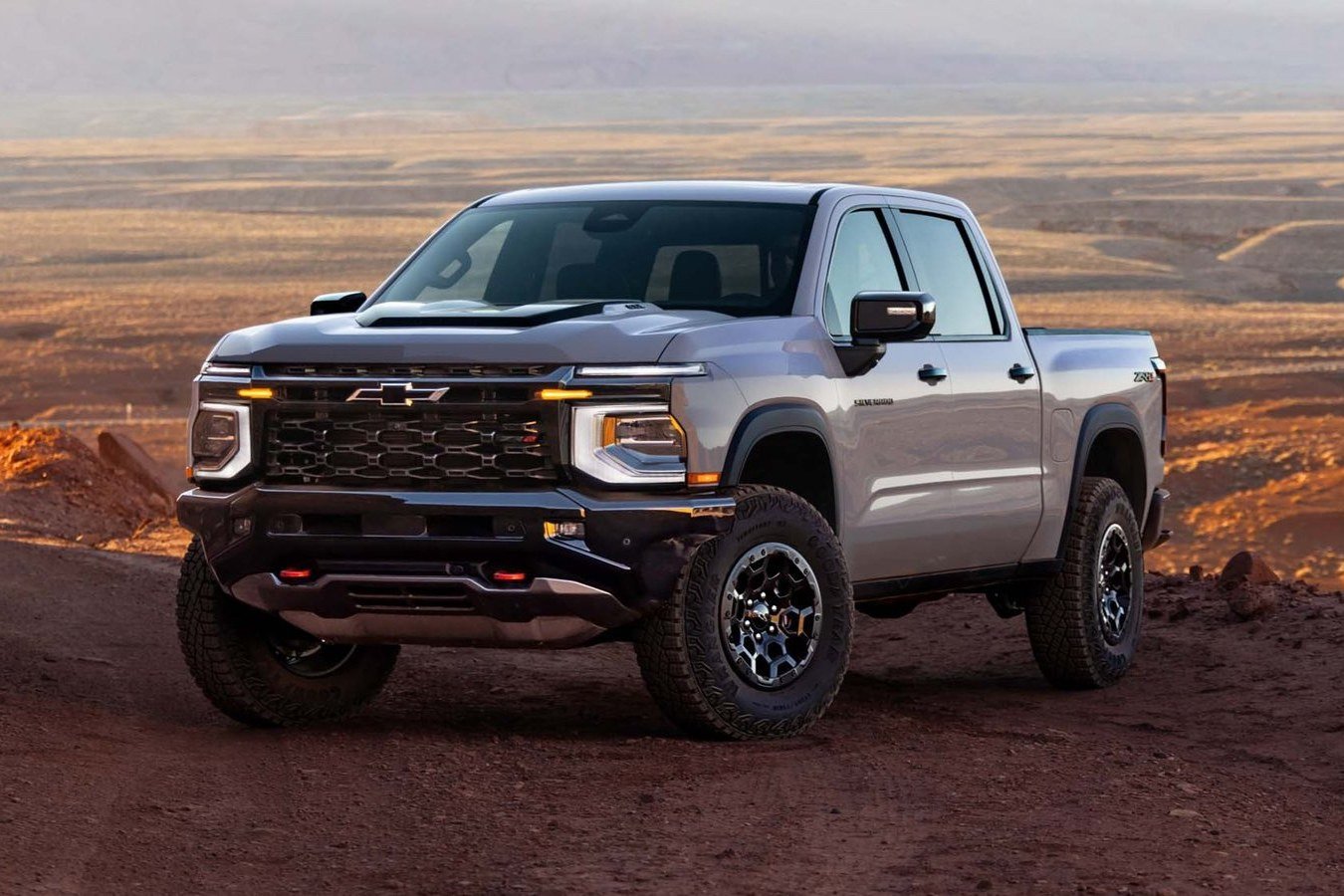 Silver 2027 Chevrolet Silverado ZR2 parked in the desert