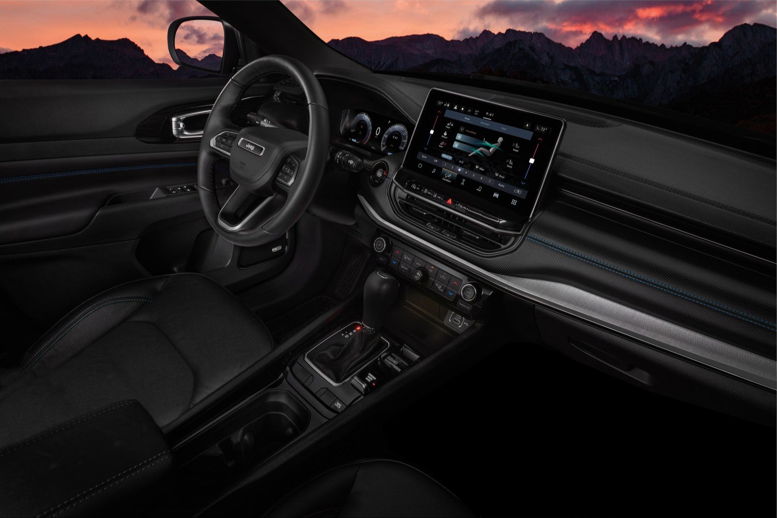 2027 Jeep Compass dashboard with center touchscreen and steering wheel