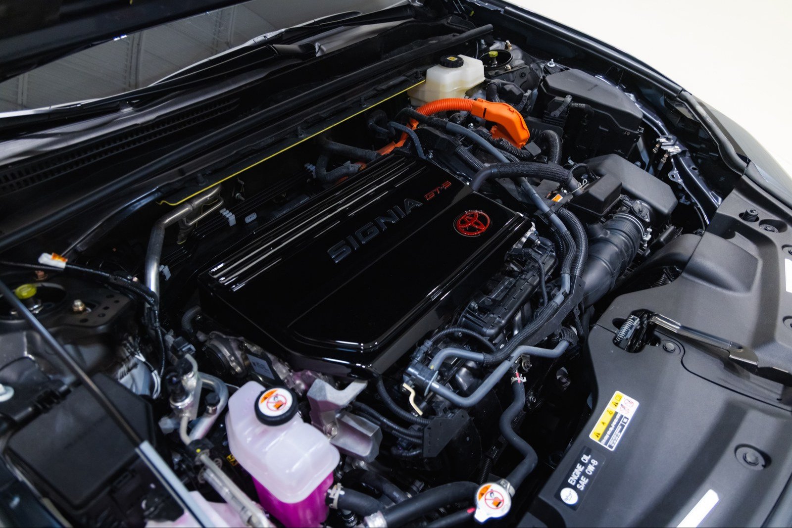 Crown Signia GT-S engine bay with branded black engine cover