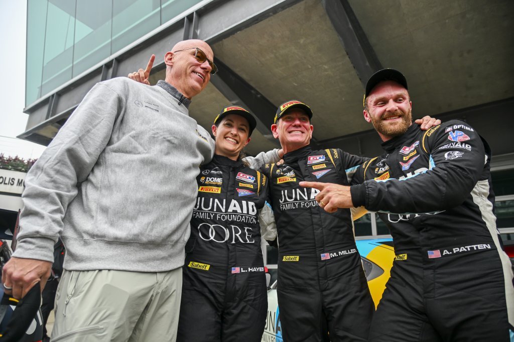 Laura Hayes, Marc Miller and Allen Patten celebrate at Indianapolis