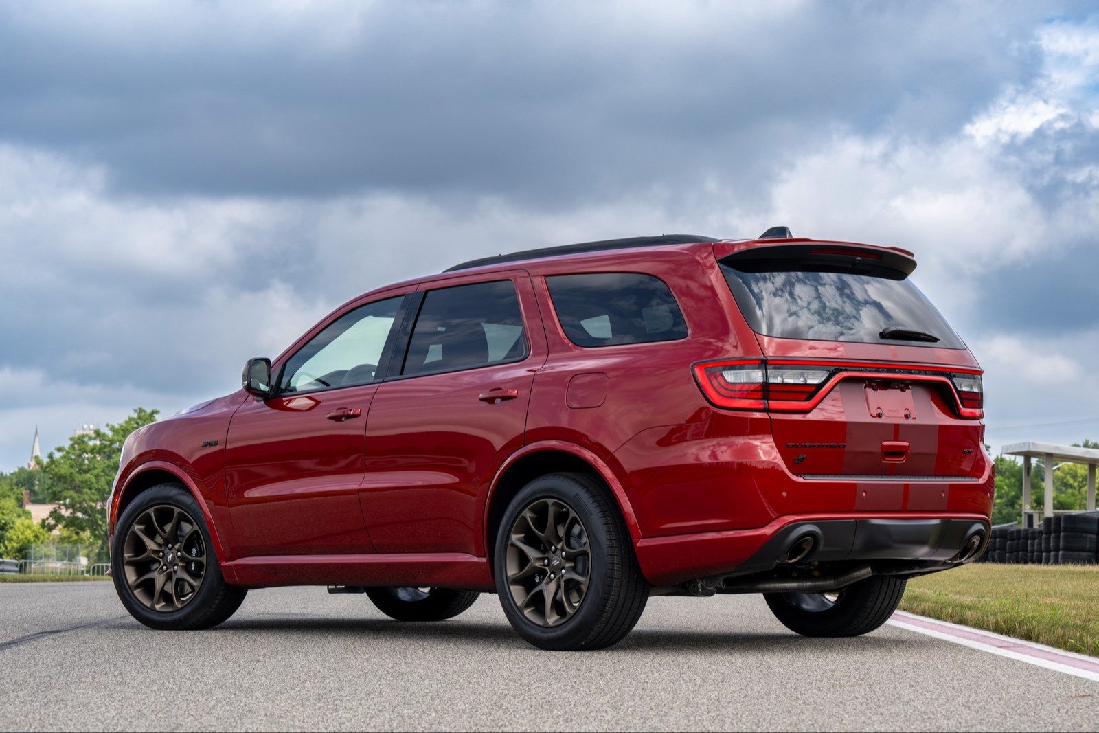 Red Dodge Durango rear three-quarter view on a test track