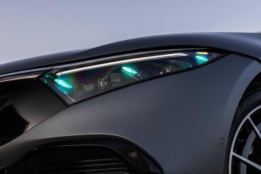 Cyan marker light inside the headlamp of a Mercedes-Benz EQS