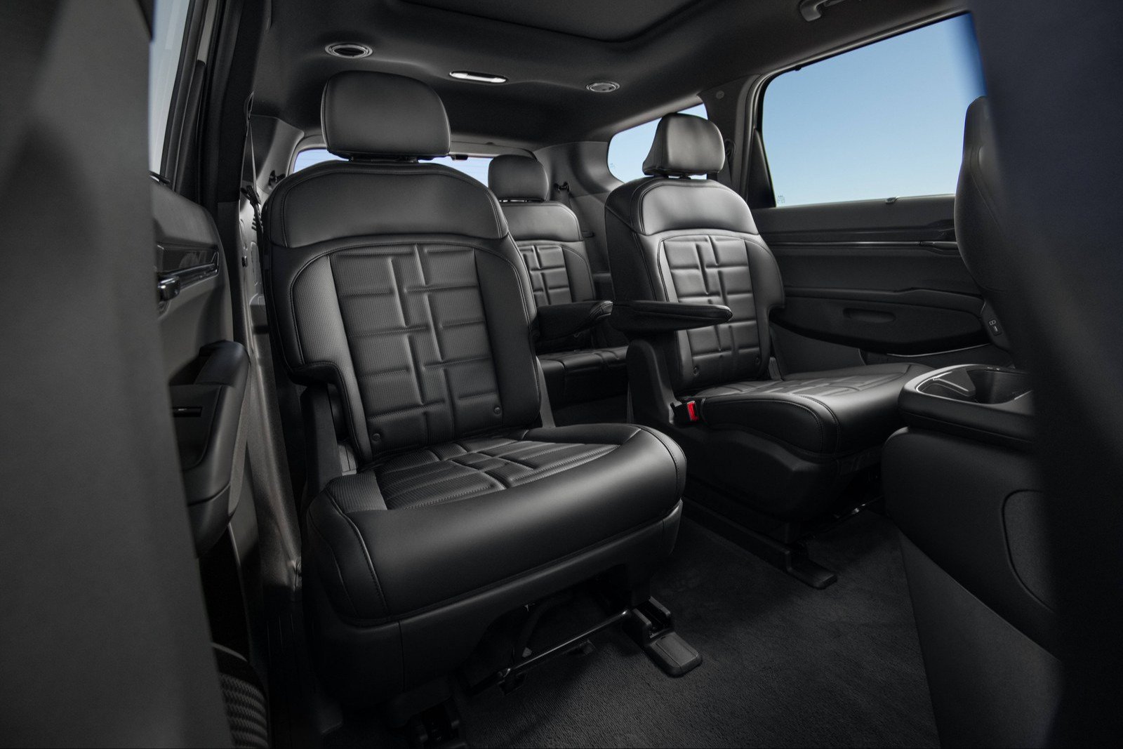 Black second-row captain's chairs inside the 2027 Kia EV9