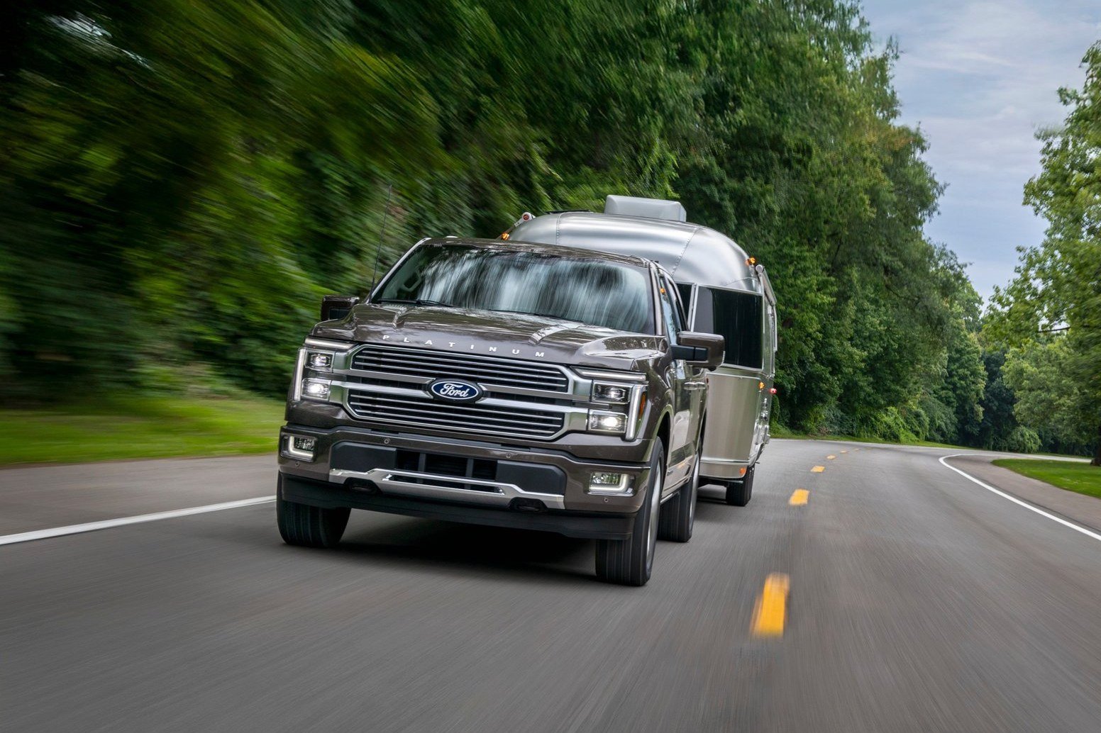 2026 Ford F-150 Platinum towing an Airstream travel trailer