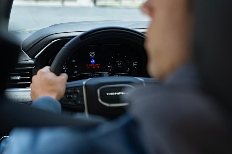 GMC Denali gauge cluster showing OnStar Stolen Vehicle Slowdown activated