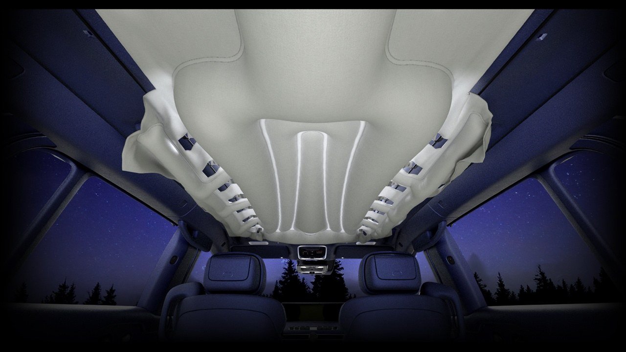 Genesis GV90 roof airbag deployed across the glass roof